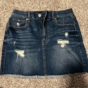 Dark wash ripped high rise denim skirt